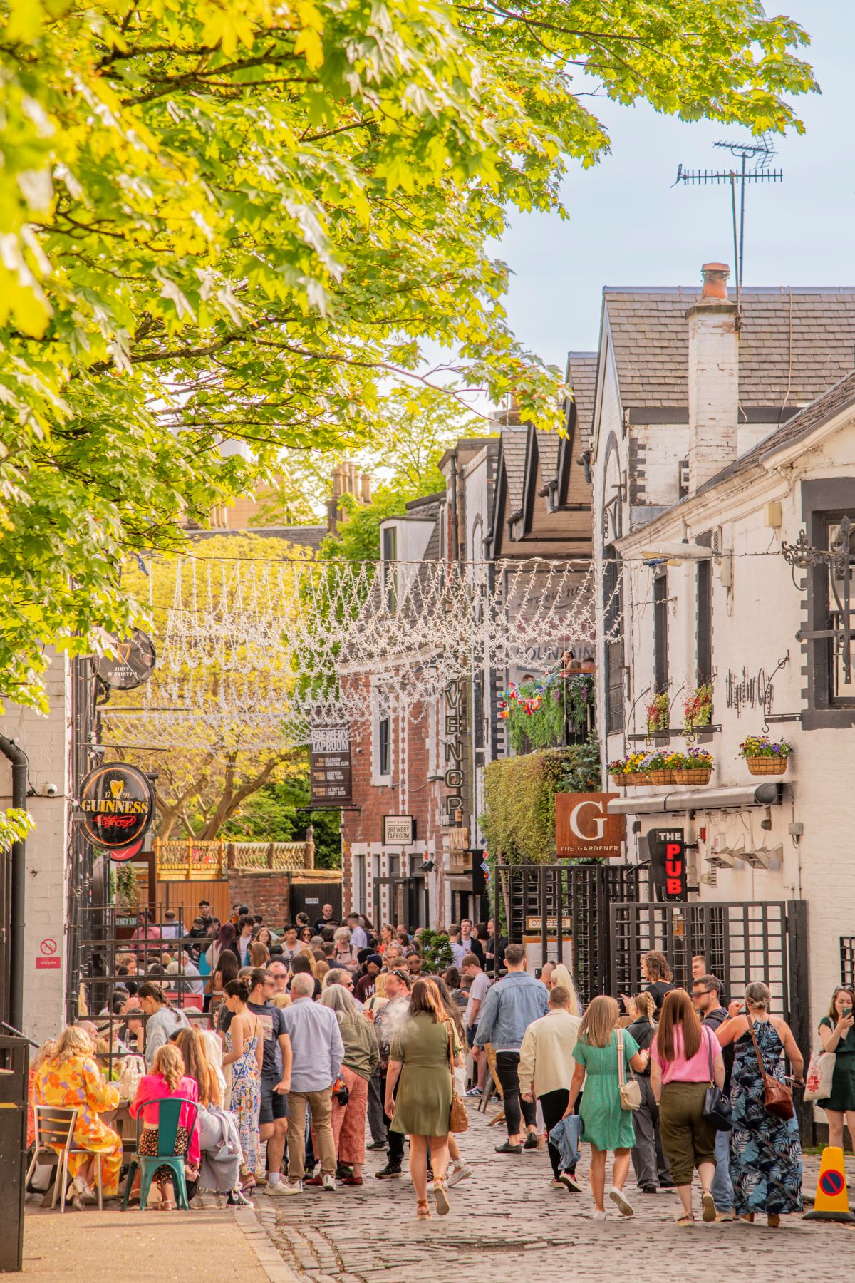 Crowd enjoying Ashton Lane, Glasgow